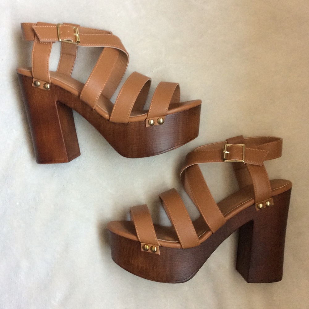 Gently used chunky platform tan wood sandals